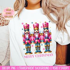 a woman wearing a merry christmas t - shirt with nutcrackers on it