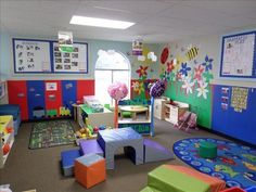 a classroom with lots of colorful furniture and decorations