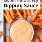 sweet potato fry dipping sauce in a small bowl next to french fries on a tray