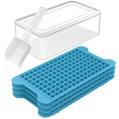 a plastic container with a scooper and three trays