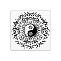 a black and white yin symbol in the middle of a circular design on a square tile