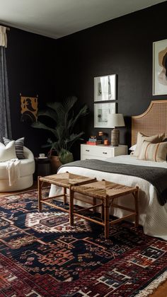 a bed room with a neatly made bed and a rug on the floor next to it