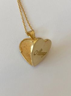 Vintage Personalized Open Heart Jewelry, Heirloom Jewelry With Heart Charm For Memorial, Heirloom Heart Charm Jewelry For Memorial, Heirloom Heart-shaped Jewelry With Hallmark, Gold Heart Pendant Locket Necklace With Hallmark, Gold Heart Jewelry Stamped 14k, Gold Engraved Heart Pendant Necklace, Dainty 14k Gold Locket Necklace For Anniversary, Gold Heart Necklace Stamped 14k For Wedding