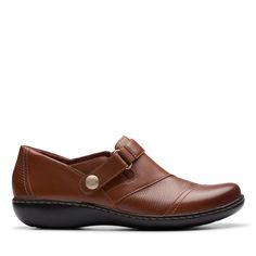 PRICES MAY VARY. Low soles and the slip on feature Ultimate Comfort footbed Hook-and-loop strap with brass button detail Textile lining Leather Upper Clarks Women's, Button Detail, Slip Ons, Loafer Shoes, Tan Leather, Moccasins, Flat Shoes Women, Special Features, Shoes Flats