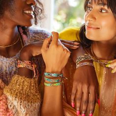 Metallic Bali Friendship Bracelet | Glow Ember | Love Is Project Thread Friendship Bracelets, Wrist Grab, Green School Bali, Freindship Bracelets, Written In The Stars, In The Stars, Recycled Projects, Woven Bracelets, Good Friends