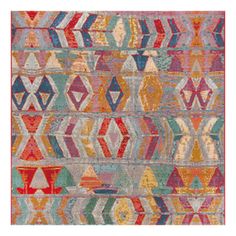 an old rug with many different colors and patterns