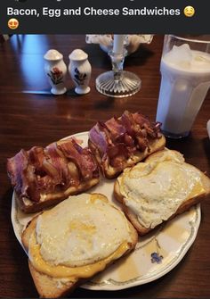 bacon, egg and cheese sandwiches are on a plate