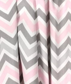 a pink and grey chevroned dress with white stripes