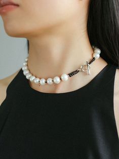 Elevate your outfit with this black spinel and round baroque pearl OT choker that exudes sophistication. This choker is expertly crafted, with stunning black spinel beads and dazzling round baroque pearls creating a harmonious contrast of textures and tones. The adjustable OT clasp ensures a comfortable fit, and the elegant design easily transitions from day to evening, making it a versatile addition to your jewelry collection. Metal: Recycled Sterling Silver Plated On Brass Pearl: Freshwater Baroque Pearls 10-11mm Gemstone: Black Spinel Chain Length: 390mm Weight: 54g Luxury Black Pearl Chain Necklace, Black Baroque Pearl Chain Jewelry, Black Baroque Pearl Necklace With Pearl Chain, Black Baroque Pearl Jewelry With Pearl Drop, Elegant Baroque Pearl Necklace With Gemstone Beads, Elegant Black Pearl Drop Necklace, Elegant Adjustable Pearl Necklace With Gemstone Beads, Black Baroque Pearl Necklace With Pearl Drop, Elegant Black Beaded Pearl Necklace