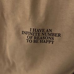 the back of a t - shirt that says i have an infinite number of reasons to be happy