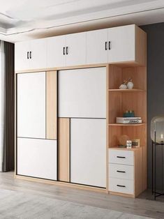 a white and wood cabinet with drawers in a living room