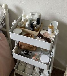 a white shelf with various items on it