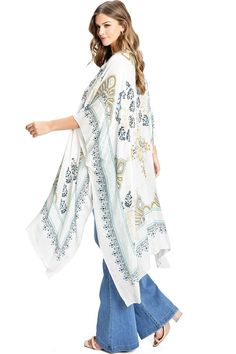 Beautiful boho printed cardigan with an open-front kimono silhouette. Light, sheer fabric is great for layering over casual outfits or as a cover-up. CARE | Hand Wash Cold CONTENTS | 100% Viscose MEASUREMENTS | 46"/117 cm Top to Bottom (Size O/S) MODEL | 5'8 - wearing O/S IMPORTED Bohemian V-neck Cardigan With Floral Print, White Boho Print Kimono For Beach Cover-up, Casual Wrap Cardigan For Beach Cover-up, Boho Print Tunic Kimono For Beach Cover-up, V-neck Boho Print Kimono For Beach Cover-up, Spring Printed Wrap Kaftan, Bohemian Floral Print Cardigan For Layering, Festival Printed Open Front Kaftan, Casual Long Printed Cover-up