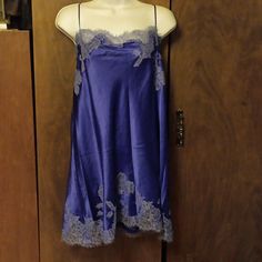 Nwot - Victoria Secrets - Royal Blue With Lace Chemise - Xlarge Simply Stunning And Elegant. There Is Gorgeous Lace All Over The Bodice And Hemline Is A Beautiful Pattern In A Light Blue Hue Which Is Different Than The Usual White, Beige Or Black Lace. Straps Are Adjustable. Measurements: Bust 20" Hip 22" Length 33". Mint Condition Brand New Never Worn. The Blue Robe In The Last Pic Is Sold Separately In My Closet. I Only Have One Robe In Each Color For All My Lingerie Items So Once Sold Its Gon Victoria's Secret Blue Sleepwear With Lace Trim, Victoria's Secret Blue Sleepwear For Night, Blue Chemise For Summer Nights, Black Satin Slip Dress, Pink Lace Bodysuit, Victoria Secret Slip Dress, Secret Dress, Lace Chemise, White Slip Dress