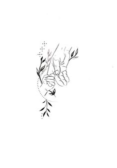 two hands touching each other over a plant