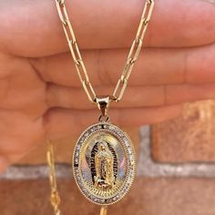 This Elegant Our Lady Of Guadalupe Necklace Features A 14k Gold-Filled Pendant, Beautifully Crafted To Honor The Virgen De Guadalupe. Perfect For Women, This Fine Fashion Jewelry Piece Combines Faith And Style, Offering A Timeless Symbol Of Devotion. Ideal For Everyday Wear Or Special Occasions, It Adds A Touch Of Elegance To Any Outfit. Description: Brand New! Won’t Tarnish Won’t Tarnish Water Resistant Hypoallergenic Nickel Free Material: 14k Gold Filled Size: 16", 18" And 20" Inches Chain Thi Lady Of Guadalupe Necklace, Outfit Description, Guadalupe Necklace, Timeless Symbol, Our Lady Of Guadalupe, Lady Of Guadalupe, Our Lady, Paper Clip, Chain Styles