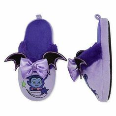 Disney Collection Slippers Vampirina Toddler Girl's Size 5-6 Plush purple scuff slippers with Vampirina embroidered on the top. A purple satin stuffed bow is sewn on the top, as well, with little black bat wings on the sides of it. Indoor/Outdoor soles on the bottom. The shoes measure about 5  3/4 inches in length. Brand New With Tags! Panda Slippers, Purple Slippers, Cute Casual Shoes, Girls Ballet Flats, Mary Jane Shoes Flat, Disney Clothes, Disney Shoes, Unicorn Plush, Black Bat