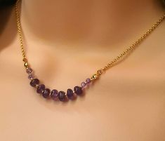 Natural gemstone purple amethyst adjustable size necklace with real 14k gold-plated brass rolo chain. Chain: real 14k gold-plated brass is 2mm x 2mm (small chain) with hand wire natural gemstone purple amethyst (4-6mm) connector and .2cmx.2cm (2mm x 2mm) 18k gold plated spacers. Necklace length  15-17 inches (includes 2" extension chain).  Material: -natural gemstone, real 14k & 18k gold-plated brass -------------------- SHIPPING ◊ Get your orders FAST! Our processing time is only 1-2 business days for most orders.  ------------------- JEWELRY PACKAGING ◊ This item comes packaged in our high quality metal jewelry box with red velvety cover and white satin lining inside lid - ready to gift! -------------------------- CUSTOMER SERVICE: * We pride ourselves on our quick response time, so don' Necklace Gold Chain, Natural Gemstone Necklace, Amethyst Necklace, Rolo Chain, Gold Chain Necklace, Gold Plated Necklace, Jewelry Packaging, White Satin, Necklace Length