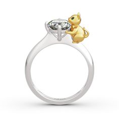 The perfect gift for cat lovers. Crafted in sterling silver, this ring in Hug Me® collection features a shimmering round cut stone hugged by a little cat, which is designed to be so lovely and super-cute. This cute cat ring is the purrfect choice for any woman who wants to put together a look which is both fun and fashionable. You will find more adorable and creative designs in our Hug Me® collection.Carat Weight: 2.5 ctStone Size: 7 mmStone Type: Jeulia® StoneNumber of Stones: 1 Stone Shape: RoundStone Color: Diamond WhiteWeight: 4.01 gWidth: 2.7 mmHeight: 8.8 mmThickness: 1.2 mmMaterial: 925 SilverPlating Color: Silver, Yellow Gold Elegant Round Ring With Cat Design, Anniversary Rings With Cat Design, Anniversary Cat Design Rings, Sterling Silver Cat Design Rings For Anniversary, Anniversary Sterling Silver Rings With Cat Design, Cat Rings, Jewelry Knowledge, Antler Ring, Pear Cut Engagement Rings