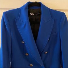 Zara Nwot Aso Princess Of Wales Kate Middleton Double Breasted Blazer Jacket In Cobalt Blue With Gold Accents. Nwot In Excellent Condition And Quality. All Hardware Is Present And Functional. Gently Tried On One Time. No Flaws To Note. The Color Is Cobalt, Royal Blue With Gold Accents. The Jacket Is Lined. The Pockets Are Decorative. The Jacket Is Double Breasted. Shoulder Pads! Approx Measurements Laid Flat: Pits: 17.5” Shoulders: 15.5” Back Center Length: 27” Waist: 15” Sleeves: 22.5” Fast Shipping. Smoke-Free Home. Reasonable Offers Accepted. Measurements Are Approximate. Luxury Blue Double-breasted Outerwear, Luxury Blue Blazer For Fall, Designer Long Sleeve Blazer, Designer Blue Single Breasted Outerwear, Zara Blue Formal Outerwear, Designer Blue Outerwear With Button Closure, Blue Double-breasted Blazer For Office, Designer Blue Double-breasted Outerwear, Fitted Blue Double-breasted Outerwear