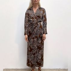 The Zara Wrap Dress In A Satin Floral Printed Maxi Style Is Perfect For Summer & Fall! This Shirtdress Ties From The Inside Right Side And Left Outer Side. The Dress Has A Sexy Front High Slit Guaranteed To Get Everyone's Attention! Wear With Strappy Sandals In Warm Weather And Knee/Thigh-High Boots In The Cooler Days! Nwt -Medium -Bust 18" -Length 51" -Lapel Collar -Long Sleeves -Jewel Button Cuffs Casual Business Vacation Travel Party Wrap Dress Summer Fall Autumn High Leg Slit Resort Wear Fem Wrap Dress Summer, Maxi Styles, Travel Party, Long Shirt Dress, Long Sleeve Shirt Dress, Vacation Travel, Printed Maxi, High Leg, Dress Summer