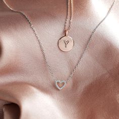 Our open heart pendant is a timeless expression of love. It’s the sweetest gift for yourself or for someone you hold close to show them just how much you care for them. With sparkling cubic zirconia and a dainty chain, this piece is perfectly flirty and feminine. 14KT yellow, rose or white gold plated AAAAA Cubic Zirconia Measurements: Diameter: 8mm (.3”) Chain length: 18”+2” extender Dainty Pendant Necklace, Dainty Choker Necklace, Heart Choker Necklace, Dainty Necklaces, Open Heart Necklace, Dainty Choker, Simple Addition, Heart Choker, Dainty Pendant