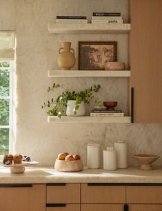 the kitchen counter is clean and ready to be used as a place for breakfast or dessert