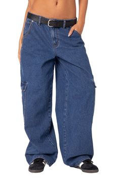 Travel back to the 2000s in nonstretch-denim cargo pants flaunting a low rise, a black belt, full-length baggy legs and plenty of pockets. Zip fly with button closure Five-pocket style; cargo flap-patch pockets Removable belt 100% cotton Machine wash, dry flat Imported