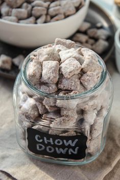 a glass jar filled with muddy dog treats