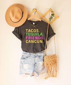 a t - shirt that says tacos, tequila friends cancun on it