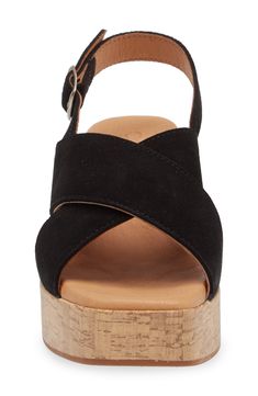 Crisscross leather straps and a slip-resistant rubber sole keep your foot in place as you strut your stuff in this summery sandal lifted by a cork platform. 2 3/4" heel; 1 3/4" platform Leather upper and lining/rubber sole Made in Spain Beach Suede Platform Footbed Sandals, Casual Black Cross Strap Footbed Sandals, Black Cork Footbed Sandals For Summer, Cork Open Toe Sandals With Heel Strap, Platform Sandals With Cork And Round Toe, Summer Black Cork Footbed Sandals, Cork Platform Sandals With Round Toe, Black Cork Sandals With Buckle Closure, Suede Ankle Strap Sandals With Cork-bed Midsoles