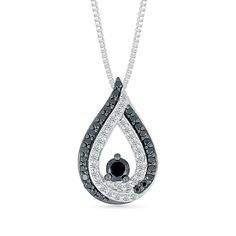 Complete your look with this stunning pendant necklace. Crafted in sterling silver, this pendant features a teardrop shape that is decorated with glistening round diamonds and bold treated black diamonds. The diamonds are 1/3ctw, I in color, and I2 or better in clarity. The black diamonds have been treated to achieve color. This pendant measures 16.8mm in length and 19.7mm in width and comes suspended from an 18 inch box chain with a lobster clasp. Diamond White Drop Necklace With Diamond Accents, Silver Teardrop Pendant Diamond Necklace, Silver Teardrop Diamond Cut Drop Necklace, White Gold Teardrop Pendant Drop Necklace, Silver Teardrop Diamond Necklace With Accents, Diamond White Teardrop Necklace With Diamond Accents, Teardrop Diamond White Necklace With Diamond Accents, Silver Drop Diamond Necklace With Accents, Anniversary Necklace With Black Diamonds