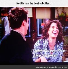 a man and woman are laughing together on the television screen, with caption that reads netflix has the best subtitles