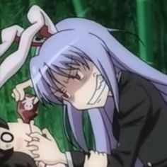 an anime scene with two people and one is holding another person's head in the air