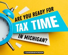 a blue alarm clock sitting on top of a yellow background with the words are you ready for tax time in michigan?