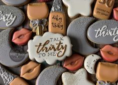 some cookies that are decorated to look like they're talking to each other with words on them