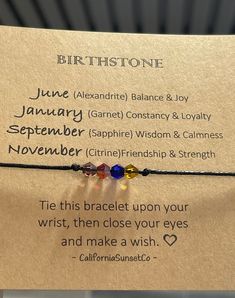 BirthStone Bracelet- Birthstone Jewelry, Month Stone, Birthstone Bracelet Gift for Her/Him Top Quality, Beautiful, Bicone Beads You chose the Birthstones & Cord Color When choosing a total of 1 Birthstone you get 3 stones on the bracelet of the same color. Anything more than 1 Birthstone Color, you will get 1 stone per color. Total 5 Birthstone combinations Max. What's included: 1 Bracelet, 1 Bracelet Card Holder, 1 Sheer Jewelry Bag Crystal Bracelet With Stones As A Gift, Adjustable Gemstone Bracelets For Birthday Gift, Adjustable Gemstone Bracelets For Birthday, Adjustable Crystal Bracelet With Stones As Gift, Adjustable Beaded Bracelets With Stones For Gift, Adjustable Beaded Bracelets With Stones As Gift, Adjustable Beaded Stone Bracelets For Gift, Adjustable Beaded Stone Bracelets As Gifts, Bracelet Card Holder