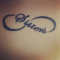 a woman's stomach with the word sisters written in cursive writing on it