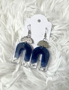 Blue & Silver colored resin drop earrings.  2" drop length Crafts For Book Lovers, Blue Resin Earrings For The Beach, Blue Resin Earrings For Beach, Elegant Blue Resin Earrings, Blue Artsy Resin Earrings, Blue Resin Teardrop Earrings, Pink Jellyfish, Diy Resin Projects, Resin Projects