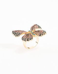 Unleash your inner butterfly with this Gold Jeweled Butterfly Ring! With its vintage-inspired design and sparkling gemstones, it adds a chic touch to any look, taking you effortlessly from day to night. Material: Crystal Color: Multicoloured Dimensions: Diameter 17 mm x Band Width 5 mm Feature Dimensions: Feature Width 41 mm x Feature Length 30 mm | Lovisa Gold Jeweled Butterfly Ring, Size: Small/Medium Elegant Butterfly Ring For Parties, Elegant Adjustable Butterfly Ring For Party, Gold 14k Butterfly Shaped Ring, Elegant Adjustable Butterfly Metal Ring, Fine Jewelry Butterfly Ring With Gemstone, Elegant Adjustable Metal Butterfly Ring, Luxury Fine Jewelry Butterfly Ring With Gemstone, Gold Butterfly Ring With Butterfly Charm, Luxury Butterfly Ring With Gemstone