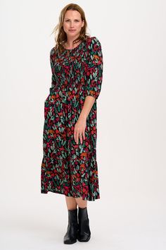 Our Trudie Smock style works year round. This style has an elasticated shirred bust, full length sleeves with frill cuffs and a full midi skirt. The playful hand-drawn 'Lost Dinosaur' print features scenes of dinosaurs among foliage. This print has an Autumnal feel with dark green, sage, tan, mustard and deep magenta pink. LENZING™ ECOVERO™ Viscose fabric is sustainable, lightweight and breathable, meaning you can wear it all day in comfort. 100% LENZING™ ECOVERO™ Viscose, Machine wash (delicate) Deep Magenta, Full Midi Skirt, Green Sage, Brand Magazine, Shirred Dress, Magenta Pink, Blazer With Jeans, How To Make Clothes, Viscose Fabric