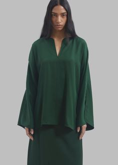 Color: Sycamore Lightweight fluid fabric Relaxed fit V neckline Split dolman sleeves Slip on style Unlined 100% Acetate Machine Wash Cold By Malene Birger. Imported Malene Birger, By Malene Birger, V Neckline, Dolman Sleeve, Maxi Skirt, Split, Slip On, Relaxed Fit, Fabric