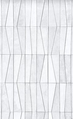 a white wall with lines drawn on it in the shape of hexagons