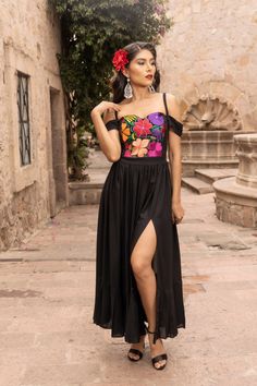 This Beautiful Mexican Floral Dress is the perfect dress for a special event or Mexican Fiesta. The off the shoulder design and slit up the leg makes it flirty and fun. It reflects the Mexican culture through its unique embroidered design and vibrant colors.  It has elastic on the back and laces to tie for an adjustable and comfortable fit.  It is embroidered by Artisanal Machine and hand manipulated by Mexican Artisans in Guanajuato, Mexico. It's made out of Rayon and is full of embroidered mul Traditional Mexico Dress, Mexican Dress Photoshoot, Mexican Party Dress Up, Mexican Fiesta Hairstyles, Mexican Beach Wedding Dress, 5 De Mayo Outfit Ideas For Women, Fiesta Theme Outfits Women, Mexican Outfits For Women Party