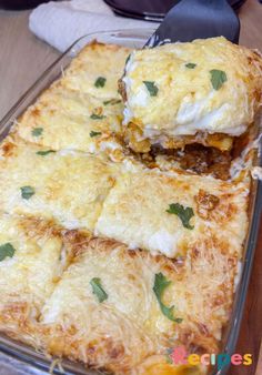 a casserole dish with meat and cheese on it, ready to be eaten