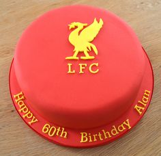 a birthday cake with the liverpool logo on it