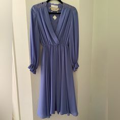 !! Edit!! Scammers Will Be Reported! This Is A Vintage Felix Arbeo & Lillie Rubin Cocktail Dress, Circa 70’s, In Near Perfect Condition. It Is Missing The Tie That Would Have Been Around The Waist In The Loops Seen In The Picture, And There Is A Small Stain On The Waist Which Would Presumably Be Easy To Remove By Professionals. Other Than Those Small Discrepancies, It Is In Almost Perfect Condition! There Is No Size Tag But It Fits Me Perfectly And I Am 5’7 And 130 Lbs, And Usually A Perfect Womens 4 And True Waist 27 In Jeans. $500 Or Best Offer Elegant Purple Midi Dress For Daywear, 130 Lbs, Almost Perfect, Size Tag, Cocktail Dress, Stain, Long Sleeve Dress, Womens Dresses, Long Sleeve