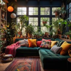 a living room filled with lots of plants