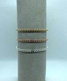 This listing is for 1 stretch bracelet (4mm beads). Choose from Gold filled, Rose Gold filled or Sterling Silver with matching pave bead accent. This bracelet is beautiful enough to wear alone or with other bracelets in our shop to create your own custom stack! 5.5 is most common child size 6.5 is most requested adult woman size Please feel free to message me about sizing, materials, etc. P.S. I love you was founded to commemorate shop owner's late father. May we always remember to tell the people in our lives that we love them. Elegant Stretch Beaded Bracelets, Elegant Gift Bracelet, Elegant Stretch Bracelet With Round Beads, Rose Gold Stackable Stretch Bracelet With Round Beads, Rose Gold Stackable Bracelet With Round Beads, Elegant Rose Gold Beaded Stretch Bracelet, Elegant Rose Gold Stackable Stretch Bracelet, Elegant Adjustable Rose Gold Stretch Bracelet, Pave Beads