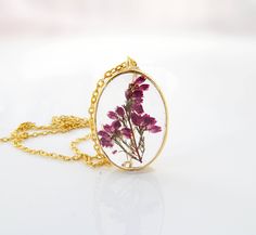 "Flower necklace / Terrarium jewelry / Mothers day gift for her / Pressed flower / Terrarium necklace / Plant jewelry Anniversary gift / gift for women / Woodland The pendant is a dainty gold plated open back bezel in an oval shape. They are so pretty, yet lightweight. The pendant measures about 1 1/3\" x 1\" oval (35mm x 25mm). A shiny silver tone 18\" snake chain is included. All jewelry items will come to you nicely packaged in a gift box. Purchase the listing below if you want to have your o Botanical Flower Necklace For Mother's Day, Mother's Day Botanical Flower Jewelry, Botanical Jewelry With Pressed Flowers, Mother's Day Flower Necklace With Pressed Flowers, Elegant Pressed Flowers Necklace For Mother's Day, Flower Shaped Necklaces For Bridesmaid Gift And Mother's Day, Flower Necklace For Bridesmaids And Mother's Day, Flower Shaped Necklaces For Bridesmaids And Mother's Day, Botanical Birth Flower Necklace Gift